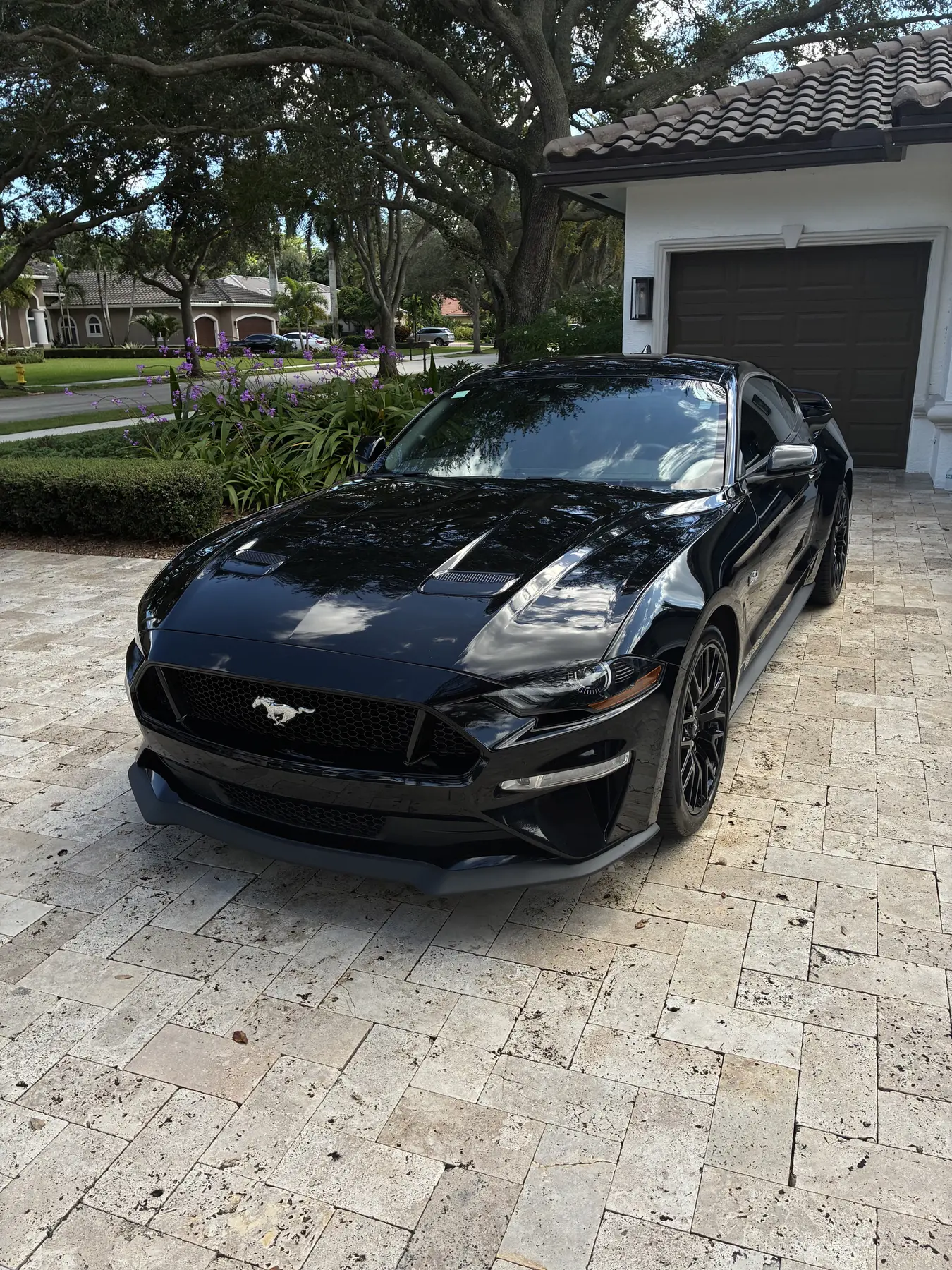 Black vehicle receiving an exterior detail